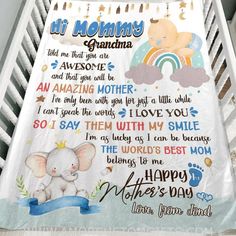 a baby blanket with an elephant saying it's mommy and the words i love you