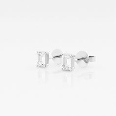 There's nothing more versatile than a pair of classic stud earrings. We love these princess cut lab grown diamond studs for every occasion, be it zoom meetings, brunch with friends or quiet evening dinner with your beau. Pick the size and color best suited to your ears in the color of gold that you fancy. Timeless Emerald Cut Diamond White Earrings, White Diamond Emerald Cut Earrings, White Diamond Earrings With Emerald Cut, White Emerald Cut Cubic Zirconia Earrings, White Emerald Cut Lab Grown Diamond Earrings, White Emerald Cut Earrings With Diamond Accents, White Emerald-cut Cubic Zirconia Earrings, Emerald Cut White Lab Grown Diamond Earrings, White Emerald-cut Lab Grown Diamond Earrings