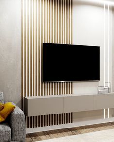 a flat screen tv mounted to the side of a wall