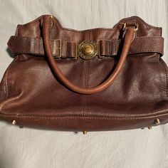 Brown Leather Burberry Purse. Some Wear On The Handles As Shown In The Photo. Over $500 Will Be Sent To Poshmark To Authenticate. Formal Satchel With Brass Hardware And Tote Shape, Formal Tote Satchel With Brass Hardware, Formal Satchel Tote With Brass Hardware, Formal Satchel With Brass Hardware, Designer Satchel With Brass Hardware For Daily Use, Designer Bags With Brass Hardware For Everyday Use, Formal Tote Bag With Brass Hardware, Top Handle Shoulder Bag With Brass Hardware For Shopping, Brass Hardware Satchel Shoulder Bag For Shopping