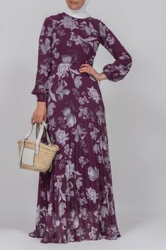 Elevate your everyday style with our Everyday casual modest high neck pleated maxi dress in ditsy floral print. The purple hue adds a touch of luxury to this versatile piece, perfect for any casual occasion. Stay comfortable and chic with its flowy silhouette and intricate pleat detailing. Indulge in the world of modest fashion with our Everyday casual DESIGN high neck pleated maxi dress in ditsy floral print in purple. The delicate pleats and flowy silhouette exude elegance, while the purple hu Modest Activewear, Full Coverage Swimsuit, Ditsy Floral Print, Abaya Dress, Pleated Maxi Dress, Pleated Maxi, Casual Design, Purple Hues, Ditsy Floral