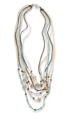 Handmade Guatemalan Graduated Bead Bib Necklace Handmade Guatemalan Graduated Bead Bib Necklace This stunning easy to wear necklace, with a magnetic closure, is a glamorous accessory that will be sure to flatter your neck. Handcrafted with beautiful Teal, yellow, clear and brown beads into a bib necklace. This is that chic accessory that will enhance your casual or dressy wardrobe. Necklace measures 20 1/4" from end to end (magnetic closure) Weight: 35 grams  PAYMENT: All items ship within one business day, your order will ship after successful credit card payment is accepted. Arizona residents must pay 8.6% sales tax. SHIPPING We ship promptly after payment has cleared. Free Shipping in the USA is sent USPS First Class Mail. Tracking will indicate if an item has been delivered to a buyer. Beaded Multi-strand Necklaces, Multi-strand Necklaces With Faceted Beads For Beach, Multi-strand Polished Beaded Necklaces For Beach, Polished Multi-strand Beaded Necklaces For Beach, Beaded Bib Necklace, Teal Yellow, Wear Necklaces, Chic Accessories, Bib Necklace