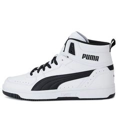 a white and black high top sneaker with the word puma written on it