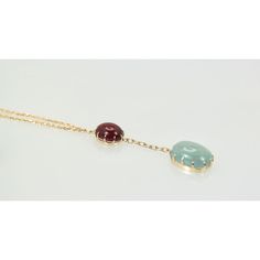 This is part of Chairish’s Fine Jewelry assortment.  METAL: 14k yellow gold WEIGHT: 16.4 grams STONES: Aquamarine, Ruby TOTAL CARAT WEIGHT: 15.4 cts  Aquamarine & Ruby Cabochon Necklace. This necklace is made from an antique watch chain and features a two stone drop. One stone is an aquamarine cabochon with a color grade of grayish blue and a weight of 9.29 carats. The second stone is a ruby cabochon with a color grade of bright red and a carat weight of 6.11.  This Aquamarine & Ruby Cabochon Ne Yellow Gold Multi-stone Cabochons For Fine Jewelry, Yellow Gold Multi-stone Cabochons Fine Jewelry, Luxury Yellow Gold Gemstone Cabochon, Yellow Gold Gemstone Cabochons Fine Jewelry, Yellow Gold Gemstone Cabochons For Fine Jewelry, Luxury Yellow Gold Oval Cabochon Gemstones, Fine Jewelry Yellow Gold Cabochons For Formal Occasions, Formal Yellow Gold Round Cabochons, Elegant White Gold Cabochons As Gift