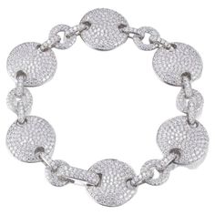 This striking pave set bracelet is the epitome of beautiful jewellery. Versatile and elegant, adding instant glamour. Featuring 13.30ct of round brilliant cuts, set in 925 sterling silver with a high gloss white rhodium finish. Dimensions 7.5 inches. Also available with a glamorous 14kt rose gold or 14kt yellow gold finish. Whether you're looking for a classic piece to add to your jewelry box, or something totally on-trend, designers Lustre of London believe that every woman should have the chan Disc Bracelet, Retro Bracelet, Set Bracelet, Elsa Schiaparelli, Diamond Simulant, Semi Precious Gemstones, Ring Necklace, Round Brilliant, Gold Finish