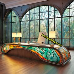 an artisticly designed bed in front of large windows