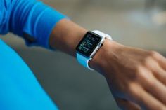 a close up of a person wearing an apple watch on their wrist with the time displayed