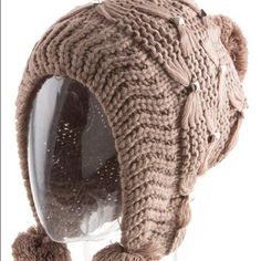 Metal Studded Pom Knit Hat With Ear Flaps Brand New - Comes In Several Colors So Don’t Forget To Check Out Our Other Listings. Tan Color Adjustable Knit Crochet Hat For Winter, Adjustable Knit Crochet Winter Hat, Warm Beige Acrylic Hats, Casual Beige Acrylic Hat, Beige Acrylic Hat, One Size Fits Most, Beige Yarn Crochet Hat For Winter, Beige Crochet Yarn Hat For Winter, Beige Acrylic Hat One Size, Adjustable Beige Crochet Hat For Winter