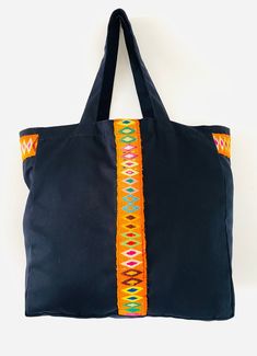 This bag was produced using recycled handmade traditional fabric of the Andean highlands. It has off-white lining inside with two pockets. Measurements:  Height: 16 inches (40 cm). Width: 16 inches (40cm). Depth/Gusset: 6 inches (15 centimeters). Drop down strap length: 11 inches (28 cm) / Handle length: 23.5 inches (60 cm) Festival Cotton Tote Shoulder Bag, Traditional Tote Canvas Bag For Everyday Use, Traditional Canvas Tote Bag For Daily Use, Bohemian Cotton Shoulder Bag For Market, Woven Cotton Shoulder Bag For Market, Cotton Woven Shoulder Bag For Market, Handmade Bohemian Canvas Shoulder Bag, Market Cotton Woven Shoulder Bag, Traditional Cotton Bag For Everyday Use