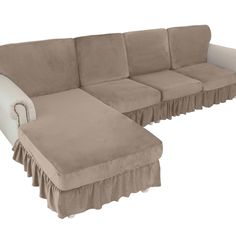 a sectional couch with a chaise lounge in front of it on a white background