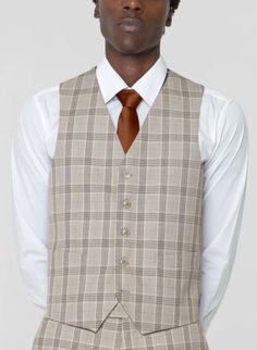 PLEASE USE “WEDDING DRESS” SHIPPING DUE TO WEIGHT. Expertly crafted, this Khaki & Black Glen Plaid Three Piece Peak Lapel Ticket Pocket Suit is the perfect addition to your formal wardrobe. Versatile enough for any formal occasion or office setting, it exudes elegance and sophistication. Its slim fit ensures a polished look while the peak lapel and ticket pocket add a touch of unique style. 50R / 44W Slim FABRICTetron/RayonLined in 100% Silk ViscoseJACKET2-buttonPeak lapelCustom flap pockets & b Tailored Sleeveless Suit For Wedding, Tailored Sleeveless Wedding Suits, Fitted Wedding Vest, White Sleeveless Suit For Wedding, Classic Tailored Wedding Vest, Office Setting, Beaded Tassel Earrings, Rice Bead, Glen Plaid