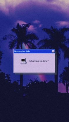 an image of a computer screen with the windows logo on it and palm trees in the background