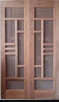 two wooden doors with glass panels on each side