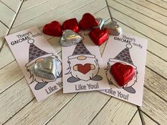 three valentine's day cards with candy hearts on them