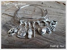 Silver Armor of God Charm Bangle or Necklace Material:  Silver Finish Alloy  Ephesians 6:10-20 scripture brought to life.  The Armor of God symbols to encourage & share your faith.  Each piece comes with a Bible verse card.   BRACELET This bangle comes with 7 charms.  Fits most wrists.  The charms are attached to a lobster clasp so you can easily add or remove them to your Charm Jewelry Pieces. This is perfect to start a charm bracelet collection!  Just clip on the charms.  Mix & Match your char Medieval Style Bangle Jewelry Gift, Adjustable Medieval Style Nickel-free Jewelry, God Symbols, Christian Charm Bracelet, Ballet Earrings, Silver Armor, Bible Verse Jewelry, Scripture Jewelry, Ephesians 6