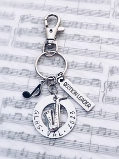 a keychain with music notes on it