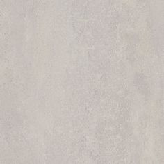 an image of a white wall that looks like concrete