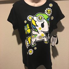 This Listing Includes One Brand New 100% Authentic 2014 Sdcc Daisy Dukes Graphic Tshirt By Tokidoki (Large) - *Rare*. This Is The Picture Of The Exact Item You Will Be Receiving. I'm Willing To Bundle Items To Reduce Your Shipping Costs. You Can Message Me More Info. Unicorn Tshirt, Daisy Dukes, Black N Yellow, Black Tee, Graphic Tee, Daisy, Graphic Tshirt, Graphic Tees, Womens Tops