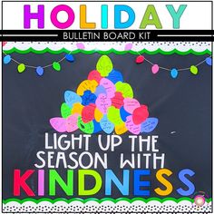 a holiday bulletin board with the words light up the season with kindness