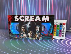 the scream board game is on display next to it's controller