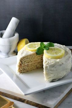 a slice of lemon cake on a white plate