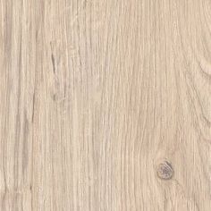 a close up view of the wood grains on this flooring material, which is light brown in color