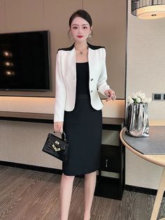 Elevate your office wardrobe with our stunning Color Block Blazer Skirt Two-Piece Dress Set. This elegant ensemble exudes sophistication, featuring a tailored blazer and coordinating skirt with striking color block detailing. Crafted from high-quality materials for comfort and style, this versatile set is perfect for formal occasions, business meetings, or professional events. Pair with your favorite blouse and heels for a polished look that commands attention. Shop now and make a bold statement Single Breasted Skirt Suit For Office, Single Breasted Office Skirt Suit, Professional Single Breasted Skirt Suit For Office, Tailored Skirt Suit For Business Casual, Professional Single-breasted Skirt Suit For Office, Professional Single Breasted Skirt Suit, Office Lady Single Breasted Skirt Suit, Semi-formal Single Breasted Office Lady Skirt Suit, Single Breasted Office Lady Skirt Suit For Semi-formal Occasions