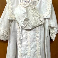 A Very Precious Vintage Lacy White Christening Dress And Bonnet Well Hand Made With No Raw Edges. It Measures 33” Long 9” Shoulders It Is For A Older Child. Many Antique Dealers Like To Hang Them For Home Decor. It Is Brand New. In New Condition White Cotton Dress-up Set, White Long Sleeve Dress-up Sets, Vintage Baptism Dress With Lace Trim For Spring, White Christening Dress, White Baptism Dress With Lace Bodice For Dress-up, Vintage Lace Collar Baptism Dress, Vintage Baptism Dress With Lace Trim, Classic Baptism Gown With Lace Trim, Christening Dress