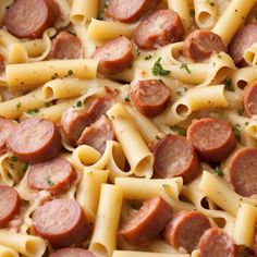 pasta with sausage and parsley in a pan