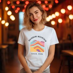 Embrace the spirit of adventure with this Rainbow Mountain Cusco Peru T-shirt! Perfect for travel lovers and adventure seekers, this stylish design captures the vibrant beauty of one of Peru's most famous natural wonders. Whether you're hiking through the breathtaking Andes or simply dreaming of your next journey, this T-shirt is a great way to show your love for exploration. Available in 5 colors and sizes S-3XL, it's the perfect gift for anyone who has a passion for travel, mountains, or Peru. White Pre-shrunk T-shirt For Hiking, White Screen Print Adventure T-shirt, White Screen Print T-shirt For Adventure, Casual Adventure T-shirt With Custom Print, Adventure Casual T-shirt With Custom Print, White Custom Print T-shirt For Adventure, White T-shirt For Outdoor Activities, Custom Print Short Sleeve T-shirt For Outdoor Activities, White Short Sleeve T-shirt For Outdoor Activities