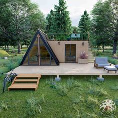 a small wooden house in the middle of a grassy area with stairs leading up to it