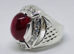 Women Quality Cabochon Red Ruby Yaqoot Sterling Silver 925 Handmade Ring Product Type: Ring Ring Size: 5 US, 6 US, 7 US, 8 US, 9 US, 10 US, 11 US, 12 US, 13 US, 14 US, 15 US, 16 US Stone Type: Ruby, Yaqoot, Rubin, Yaqut, Rubis, Roby Metal Type: Sterling Silver 925 Main Stone: Ruby Main Stone Color: Red Handmade: Yes, Artisan Ring Type: Heated & Treated (Lab Created) This Sterling Silver Ring is a perfect gift for men and women. The ring showcases an elegant design with unique Ruby stone. Get it Luxury Silver Ruby Cabochon Ring, Luxury Red Ruby Ring, Unique Cabochon Ruby Ring For Formal Occasions, Red Round Rings For Formal Occasions, Oval Cabochon Ruby Jewelry For Formal Occasions, Formal Ruby Jewelry With Oval Cabochon, Formal Oval Cabochon Ruby Jewelry, Red Jewelry With Accent Stones For Formal Occasions, Silver Ruby Round Jewelry