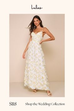 a woman in a white dress with yellow flowers on it and the words shop the wedding collection