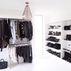 the closet is full of shoes and handbags