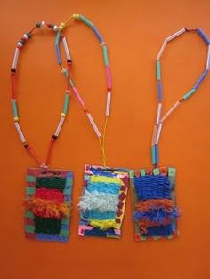 three pieces of art made out of yarn and beads on an orange background with the string attached to them