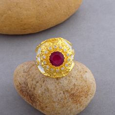 * Product Dimensions(W x H x L):-----24x18x14mm * Product Weight:-----16.3 gm * Stone Name:-----Natural Ruby Gemstone * Stone Color:-----Green * Stone Creation:-----Natural * Gemstone Shape:----- Round * Gemstone Cut:----- Cut * Gemstone Setting:----- Bezel * Product Type:----- Band Ring * Metal Stamp :----- .925 * Metal:----- Sterling Silver   💎 CARE INSTRUCTIONS 💎 Taking care of your jewelry is a piece of cake! First of all, your jewelry needs its beauty sleep, so please don't wear it to bed Gold Cluster Ring With Stone Setting For Gift, Gold Cluster Ring With Stone Setting As Gift, Gold Cluster Ring With Stone Setting - Perfect Gift, Ruby Rings With Stones For Gift, Gold Flower Ring With Stone Setting For Gift, Gold Flower Ring With Stone Setting As Gift, Ruby Rings With Stones As Gift, Ruby Open Ring With Stone Setting As Gift, Ruby Ring With Open Stone Setting As Gift