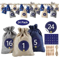 three bags with numbers on them and two drawsacks hanging from the top one