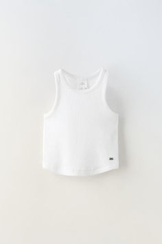 RIB RACERBACK TOP - White | ZARA United States Sporty Summer Vest Top, Casual White Racerback Top, White Racerback Trendy Tops, White Trendy Racerback Tops, Trendy White Racerback Top, White Racerback Tank Top, Casual Style, Basic Vest Top With Tank Straps, Casual White Racerback Vest, Sporty Crew Neck Vest For Spring