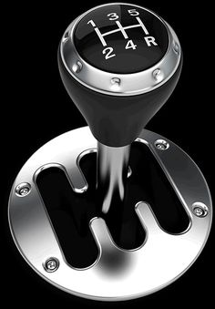 a black and silver gear knob with the letters n on it's center piece