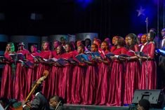 a group of people that are standing on stage