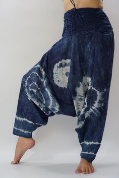 "tiedye Women Yoga Harem Pants - elastic waistband and cuffs - Fits all ! Styles Smock Waist Low Crotch Shipping & Handling * Parcels will be ship via DHL Express Fabric: Light Thai Cotton A light summer cotton with bold tie dye art. Each print is unique so yours may differ in detail, color, and pattern from that pictured but will be similar. From our experience this material can shrink and the colors may run, especially on the first few washes. To reduce shrinkage and color loss follow the Tie Dye Cotton Hippie Bottoms, Hippie Tie Dye Cotton Bottoms, Hippie Cotton Tie-dye Bottoms, Tie Dye Bottoms For Festivals, Bohemian Tie Dye Cotton Pants, Hand Dyed Tie Dye Bottoms For Festival, Indigo Bohemian Relaxed Fit Bottoms, Festival Tie-dye Hand Dyed Bottoms, Festival Tie-dye Hand-dyed Bottoms