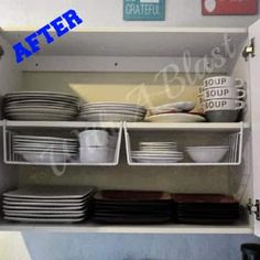 an open cabinet filled with dishes and plates on top of each other in front of a sign that says after