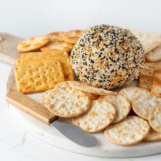 crackers and cheese balls on a plate