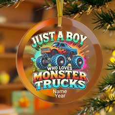 a christmas ornament that says just a boy who loves monster trucks