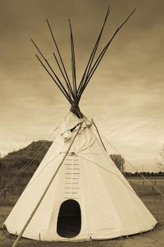 size: 12x8in Photographic Print: Native American Teepee, Grand Island, Nebraska, USA by Walter Bibikow : Fine Art Photographer Walter Bibikow has traveled the world to capture breathtaking images spanning the intricacies of the tiniest flower to the grandeur of vast architectural and scenic wonders. For three decades, Bibikow has trekked to regions including Africa, the Middle East, the Caribbean and North America, often returning to a location several times during different seasons, or in chang Grand Island Nebraska, Indian Teepee, Indian Photos, Native American Teepee, Tee Pee, Native American Photos, Survival Gardening, American Architecture, Tattoo Sleeve