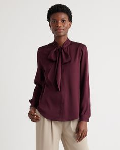 This polished blouse combines the best of both worlds. Wear the ties in a ladylike bow at the neck or leave them long and loose — whatever your mood calls for. Made of our bestselling premium mulberry silk, it has a hint of stretch for a flexible fit. Eve Elegant Fall Blouse With Bow Tie, Fall Bow Tie Neck Blouse, Fall Tie Neck Blouse With Bow, Elegant Semi-formal Tie Neck Blouse, Elegant Tie Neck Blouse For Semi-formal Occasions, Elegant Tie Neck Blouse For Semi-formal Events, Classic Silk Blouse With Tie Neck, Solid Color Tops With Bow For Fall, Fall Tops With Bow Detail