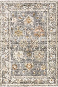 an area rug in grey, beige and orange colors with floral designs on the border