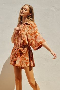 Sienna Rose Tropical Relaxed Romper - MISRED Summer Rayon Tops For Daywear, Printed Summer Tops For Loungewear, Beige Viscose Tops For Summer, Feminine Tops For Summer Loungewear, Tropical Summer Loungewear Tops, Feminine Summer Tops For Loungewear, Summer Rayon Tops For Loungewear, Chic Tops For Warm Weather, Casual Tops For Resort Season Day Out