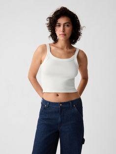 Soft, stretch cotton-modal blend cropped tank.  Round neck.  Tank straps.  Certain styles have allover prints.  * Fit: Stretch-to-Fit.  Slim & stretchy that forms to your shape.  Cropped, hits at the waist.  Models wearing Gap Cropped Cotton Bra-friendly Tank Top, Forever 21 Cotton Crop Top Tank Top, Forever 21 Stretch Tank Top, Affordable Soft-washed Cotton Tank Top, Forever 21 Fitted Cotton Tank Top, New Woman, Crop Tank, Cropped Tank Top, Stylish Girl