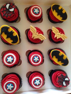 the cupcakes are decorated like superheros